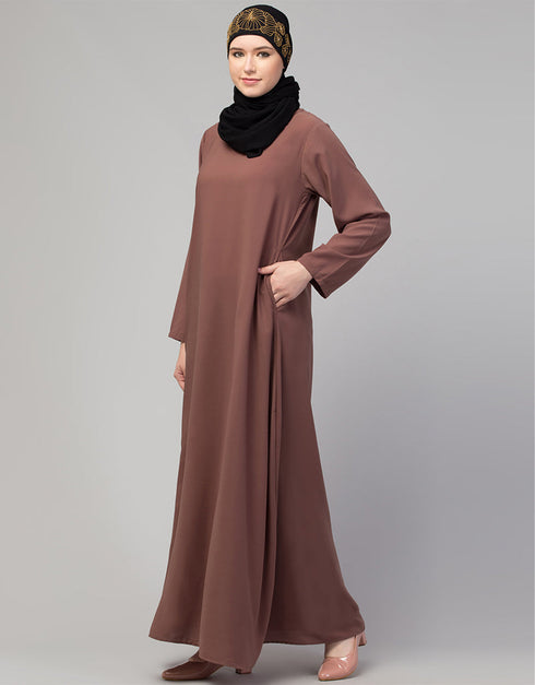 Trendy Abaya made from Nida fabric with a flared hem for a feminine touch In Color Light brown